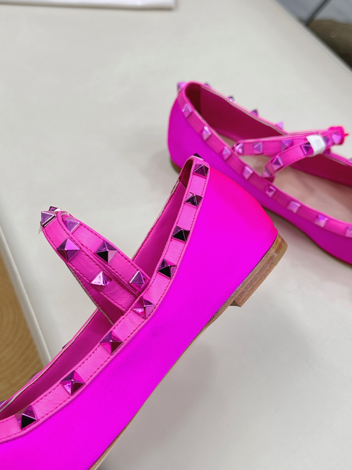 VALEN GARAVANI ROCKSTUD BALLERINAS IN HOT PINK SATIN