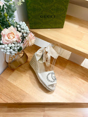 PLATFORM WITH RHINESTONE LOGO IN CREAM BEIGE CANVAS AND STRAW LINING