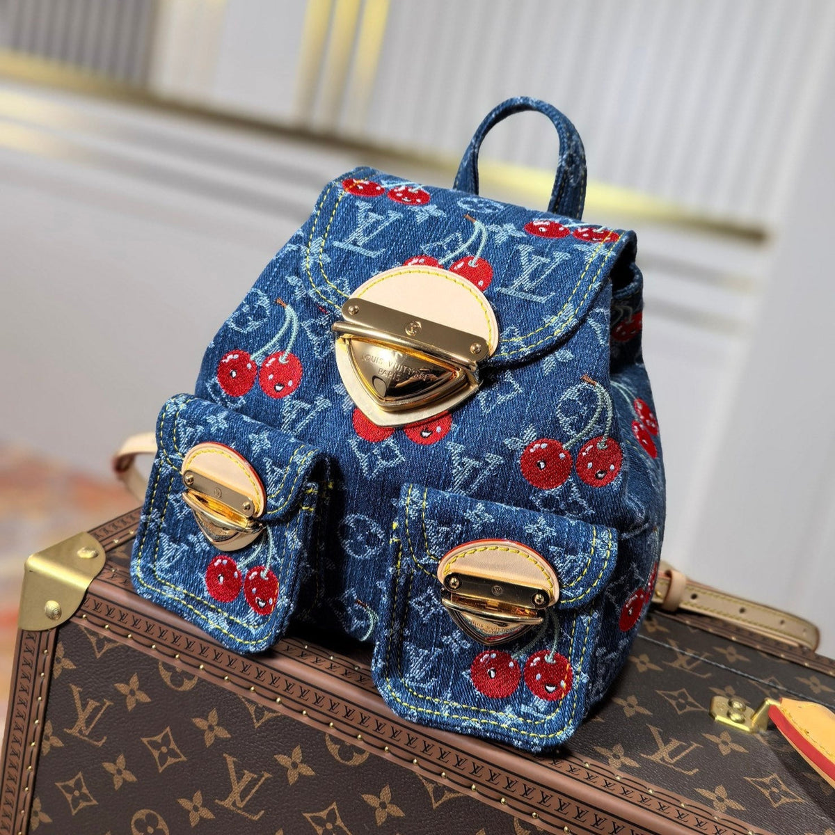 LV 25S VENICE BACKPACK 26 IN BLUE DENIM MONOGRAM CHERRY GOLD HARDWARE