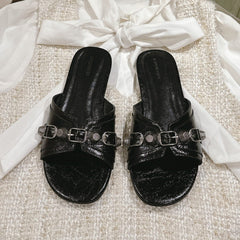 CAGOLE FLAT SANDALS IN BLACK WAX-OIL SHEEPSKIN