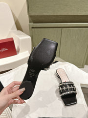 TRUMPET METALLIC MULES IN BLACK PATENT CALFSKIN WITH EMBELLISHED BUCKLE