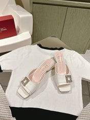 CRYSTAL HEEL MULE IN WHITE SHINY CALFSKIN WITH EMBELLISHED BUCKLE