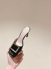 TRUMPET METALLIC MULES IN BLACK PATENT CALFSKIN