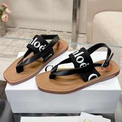 THONG SANDALS IN BLACK CALFSKIN AND CANVAS