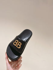 RISE SANDALS IN BLACK SHINY LAMBSKIN GOLD BUCKLE