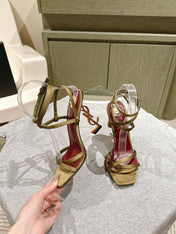 YSL 25S HIGH-HEEL SANDALS 100 MM IN MOSS GREEN SATIN WITH YSL LOGO HEEL DESIGN IN GOLD