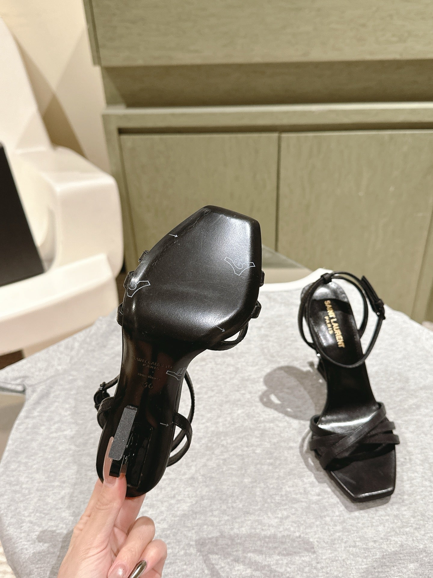 YSL 25S HIGH-HEEL SANDALS 100 MM IN BLACK LAMBSKIN WITH YSL LOGO HEEL DESIGN