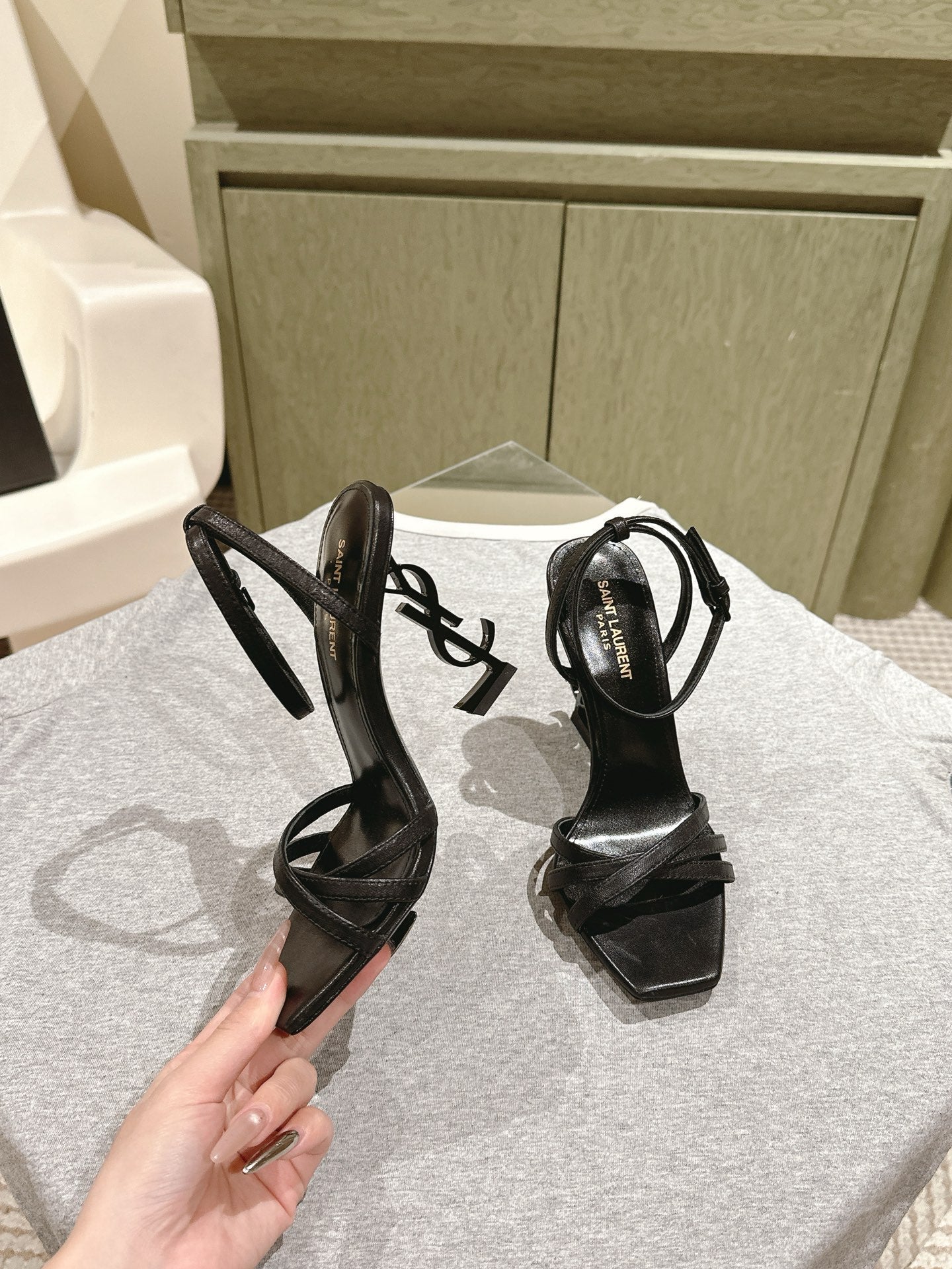 YSL 25S HIGH-HEEL SANDALS 100 MM IN BLACK LAMBSKIN WITH YSL LOGO HEEL DESIGN