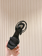 YSL 25S HIGH-HEEL SANDALS 100 MM IN BLACK SATIN