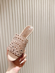 ALAIA PERFORATED SLIDE SANDALS 25S IN PINK BEIGE SUEDE