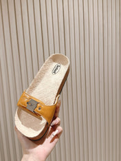 BALENCIAGA 25S SCHOLL SLIDES IN DARK ORANGE PU LEATHER WITH SILVER HARDWARE