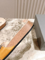 BALENCIAGA 25S SCHOLL SLIDES IN DARK ORANGE PU LEATHER WITH SILVER HARDWARE