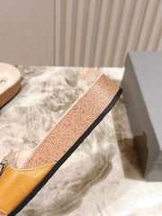 BALENCIAGA 25S SCHOLL SLIDES IN DARK ORANGE PU LEATHER WITH SILVER HARDWARE