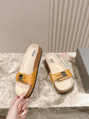 BALENCIAGA 25S SCHOLL SLIDES IN DARK ORANGE PU LEATHER WITH SILVER HARDWARE