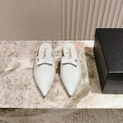 CC FLAT MULES 25S IN WHITE PATENT LEATHER