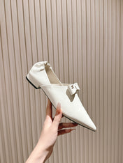 CC FLATS 25S IN WHITE PATENT LEATHER