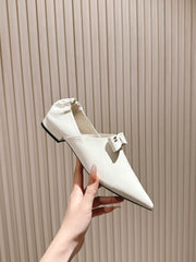 CC FLATS 25S IN WHITE PATENT LEATHER