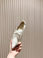 CC FLATS 25S IN WHITE PATENT LEATHER