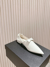 CC FLATS 25S IN WHITE PATENT LEATHER