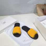 THE ROW 26S SLIDES SANDALS IN YELLOW MINK FUR AND BLACK CALFSKIN