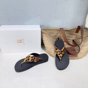 THE ROW 26S THONG SANDALS IN BLACK RUBBER WITH LEOPARD CALF HAIR STRAPS