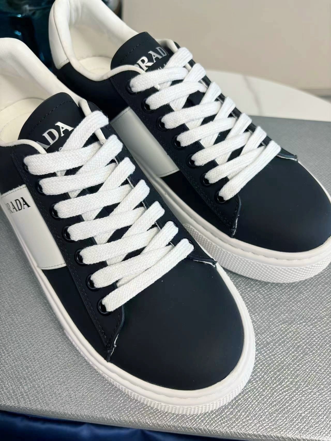 PRADA 25S LEATHER LOGO OUTLET SNEAKERS BLUISH BLACK CALFSKIN
