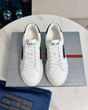 PRADA 25S LEATHER LOGO OUTLET SNEAKERS BLACK AND WHITE CALFSKIN