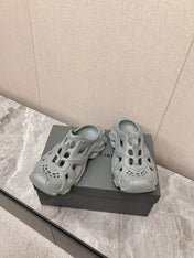 CUT-OUT MULES IN GRAY RUBBER