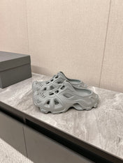 CUT-OUT MULES IN GRAY RUBBER