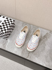 VALENTINO 25S GARAVANI X VANS SNEAKERS IN WHITE MIX BLUE CANVAS