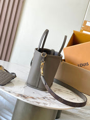 NEVERFULL BANDOULIÈRE INSIDE OUT BB 24 IN BROWN MONOGRAM CANVAS AND GRAY CALFSKIN