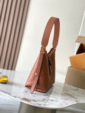 CARRYALL PM 29 IN COGNAC MONOGRAM EMPREINTE LEATHER GOLD LOGO