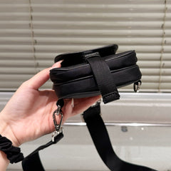 TRIANGLE LOGO MINI POUCH 17 IN BLACK RE-NYLON