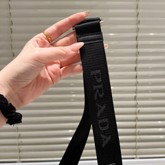 TRIANGLE LOGO MINI POUCH 17 IN BLACK RE-NYLON