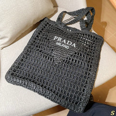 WHITE EMBROIDED LOGO TOTE BAG 39 IN BLACK WOVEN RAFFIA