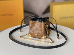 NOE PURSE 11.5 NANO CHARM BROWN MONOGRAM REVERSE CANVAS