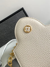 CAPUCINES BB 27 IN WHITE MIX PINK AND BEIGE TAURILLON GOLD HARDWARE