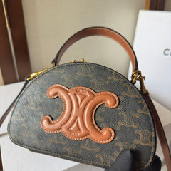 HALF MOON CASE 18 IN BLACK TRIOMPHE CANVAS AND BRONZE BROWN CALFSKIN