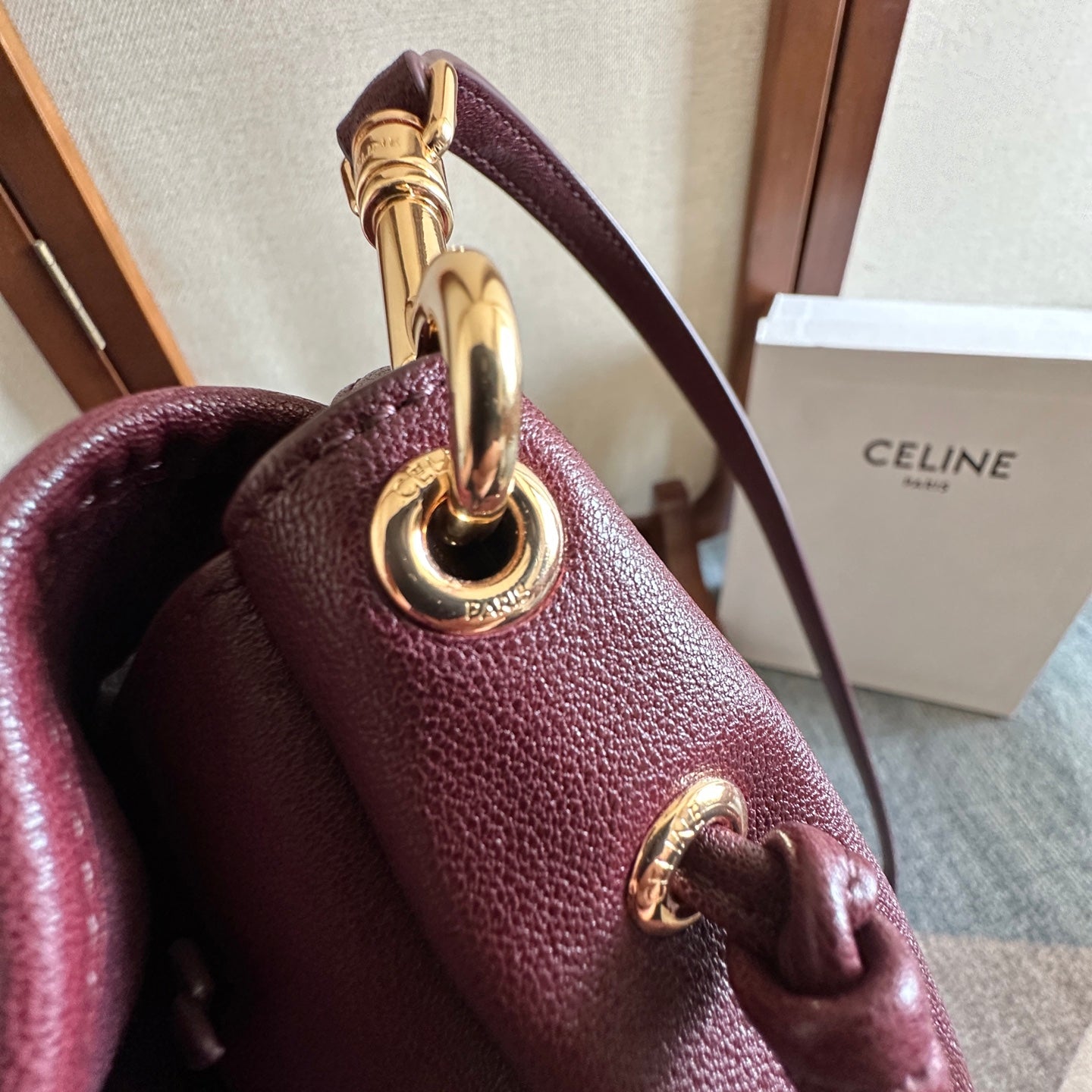 CELINE 25S HALFMOON SOFT TRIOMPHE BAG 46MM IN SYRAH RED SUPPLE SHINY LAMBSKIN