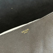 CELINE 25S HALFMOON SOFT TRIOMPHE BAG 46MM IN BLACK SUPPLE SHINY LAMBSKIN