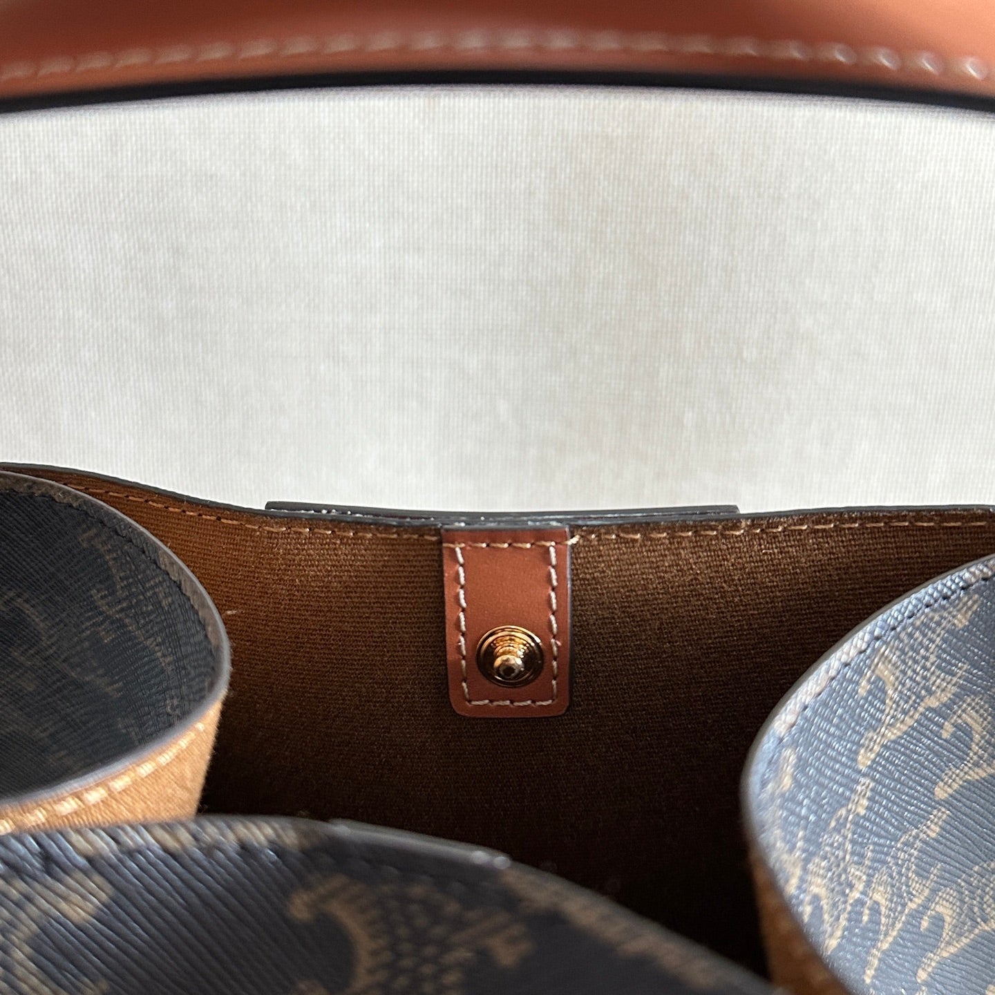 CELINE 25S CUBE BAG 18MM IN BLACK TRIOMPHE CANVAS AND DARK BORWN CALFSKIN