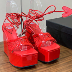 ALAIA BANQUET WEDGE SANDALS IN CHERRY RED LAMBSKIN WITH RED HEART