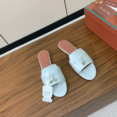 FLAT SLIPPERS IN WHITE LAMBSKIN OSTRICH SKIN