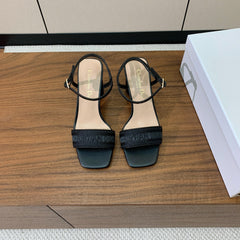 HIGH HEEL EMBROIDERED SANDAL IN BLACK CALFSKIN AND WOVEN STRAPS