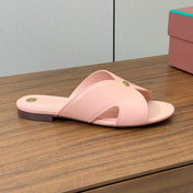 FLAT SLIPPERS IN LIGHT PINK CALFSKIN
