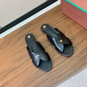 FLAT SLIPPERS IN BLACK CALFSKIN