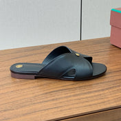 FLAT SLIPPERS IN BLACK CALFSKIN