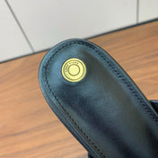 FLAT SLIPPERS IN BLACK CALFSKIN