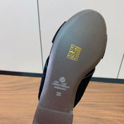 FLAT SLIPPERS IN BLACK SUEDE