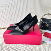 EFFLORESCENCE PUMPS IN BLACK SATIN